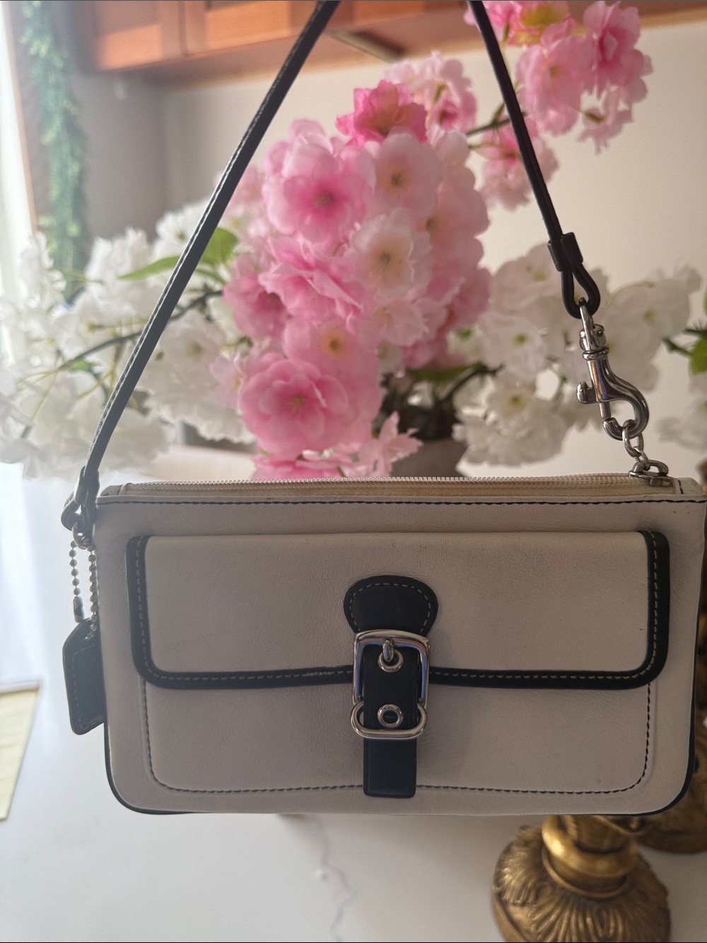 Cream Mini Shoulder Bag with Black Trim and Buckle Accent
